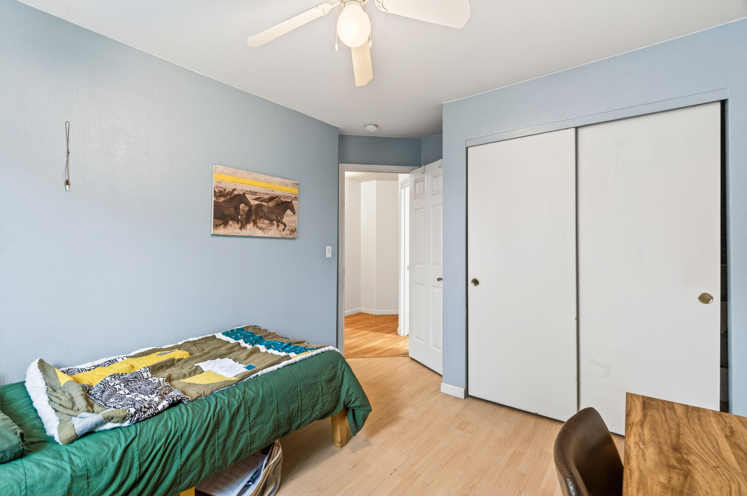 40 Ortega Court Redding, CA 96003 - Photo 19 of 29 a bedroom with a bed and a couch