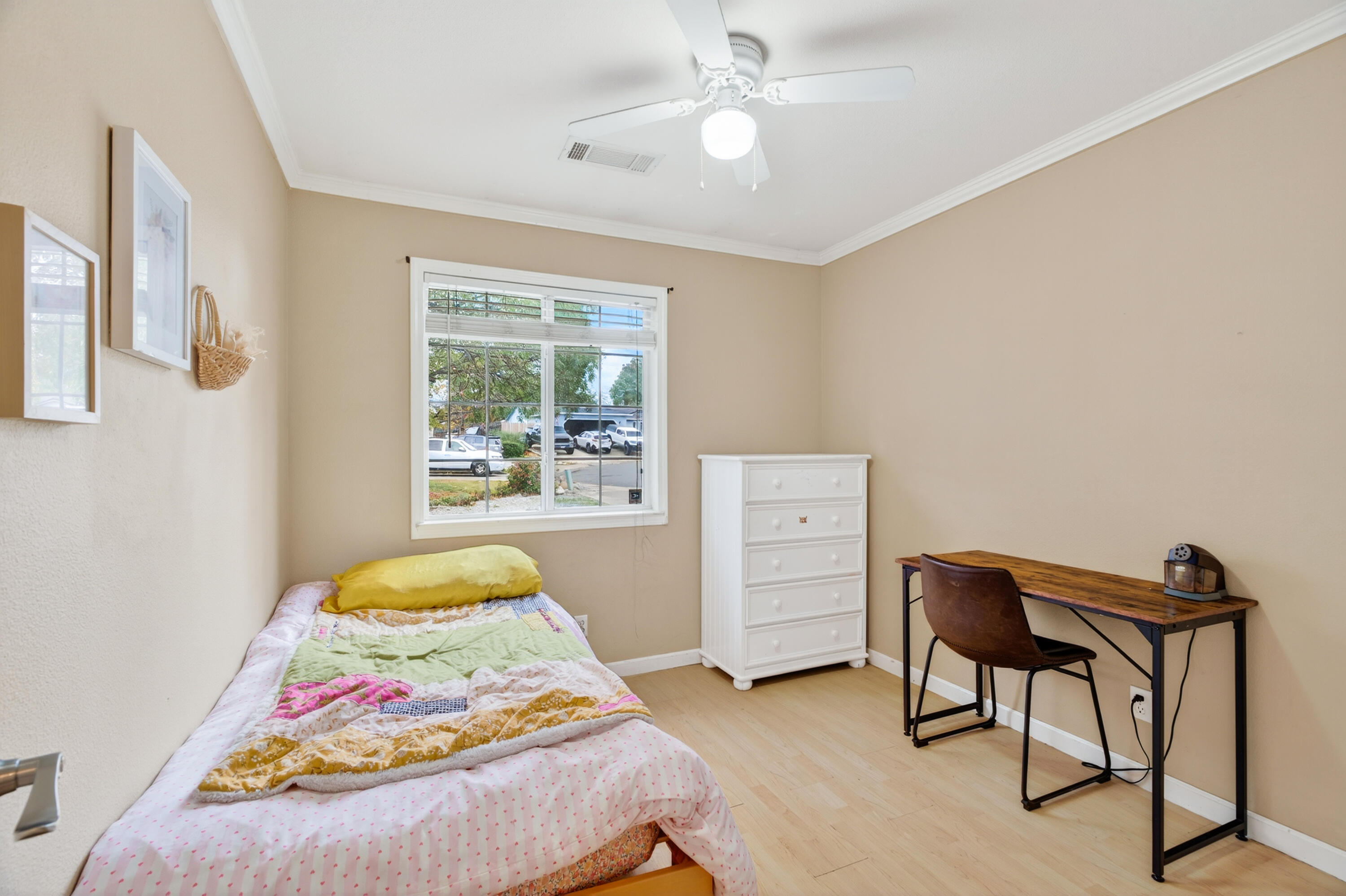 40 Ortega Court Redding, CA 96003 - Photo 20 of 29 a bedroom with a bed and a window