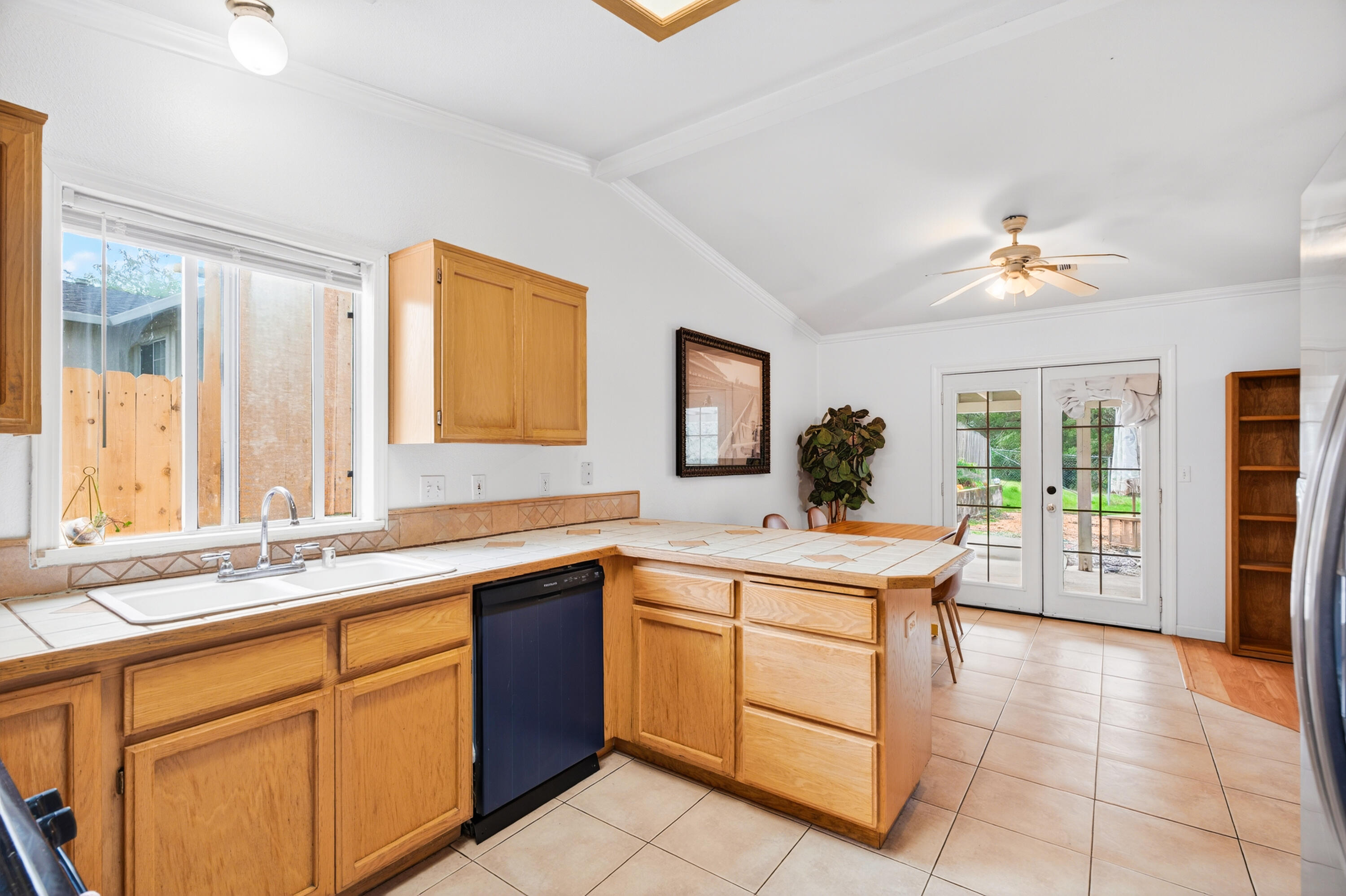 40 Ortega Court Redding, CA 96003 - Photo 10 of 29 a kitchen with a sink stove and cabinets