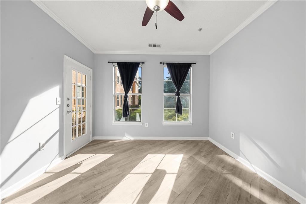 10 Perimeter Summit Boulevard, Unit 3107 Atlanta, GA 30319 - Photo 18 of 44 a view of an empty room with a window