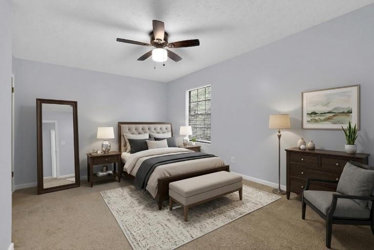 1424 Springleaf Circle Southeast Smyrna, GA 30080 - Photo 32 of 38 a bedroom with a bed and painting on the wall