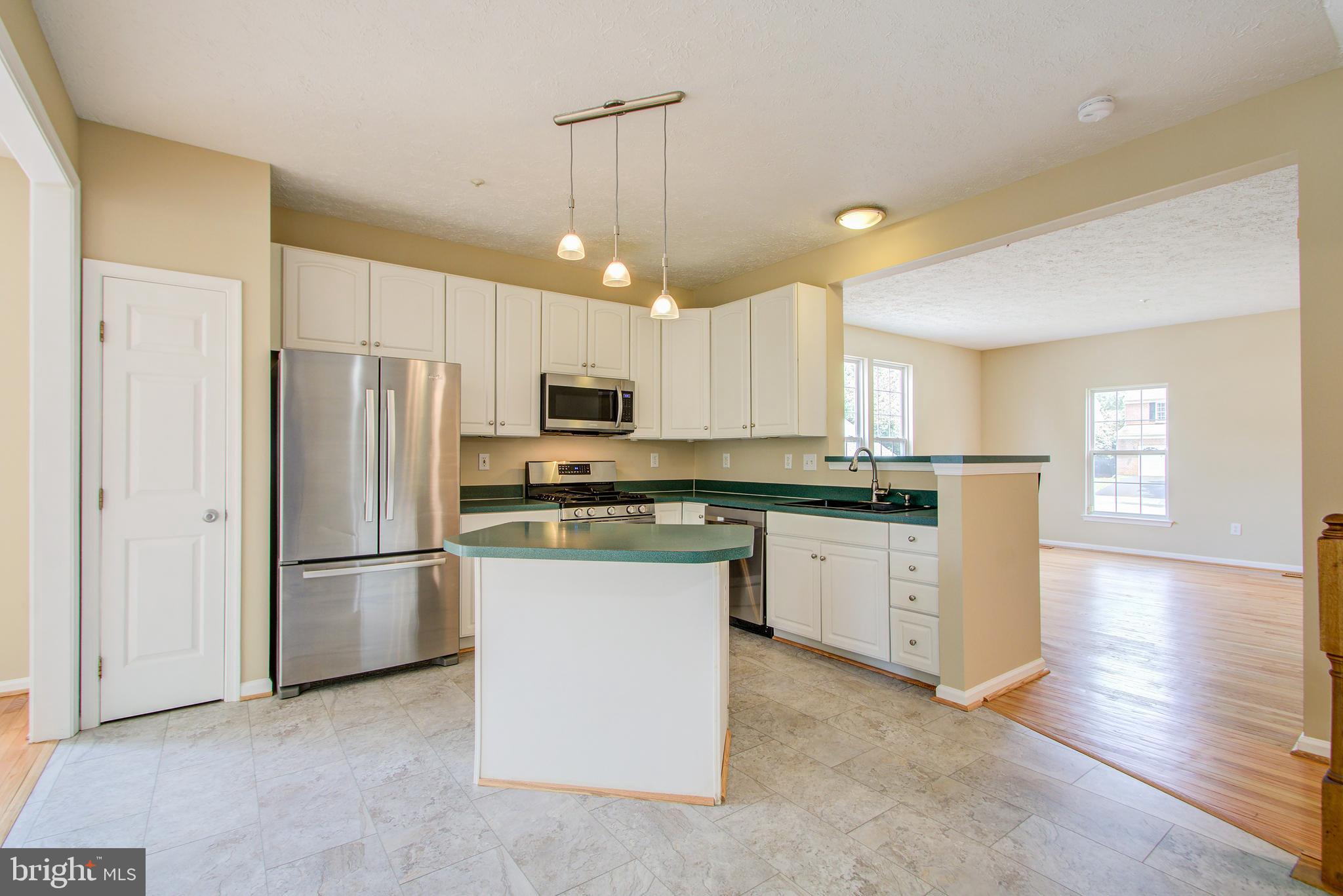 1723 Algonquin Road Frederick, MD 21701 - Photo 5 of 25 Open concept Kitchen w/ Island and Breakfast Bar