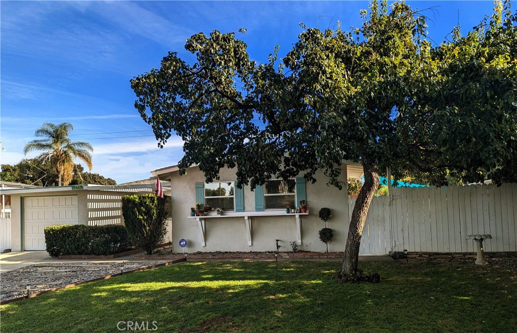 3923 Overland Street Riverside, CA 92503 - Photo 1 of 1 a front view of a house with garden