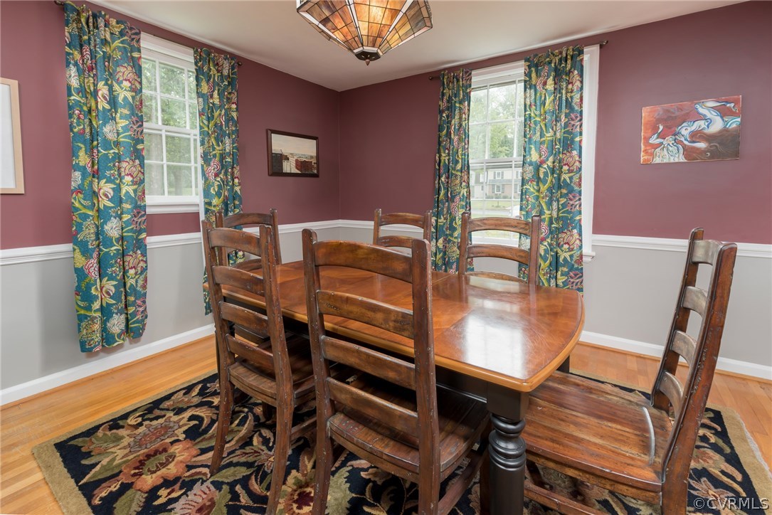 7618 Hollins Road Henrico, VA 23229 - Photo 11 of 15 a view of a dining room with furniture window and wooden floor