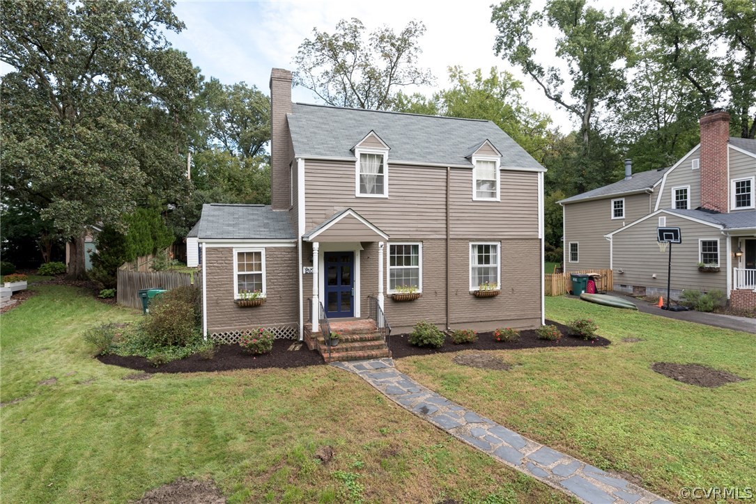 7618 Hollins Road Henrico, VA 23229 - Photo 2 of 15 a front view of a house with a yard