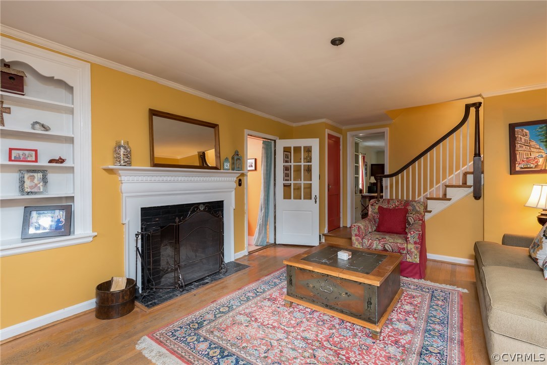 7618 Hollins Road Henrico, VA 23229 - Photo 5 of 15 a living room with furniture and a fireplace