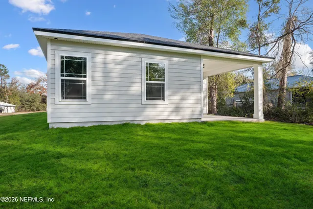 a front view of house with yard