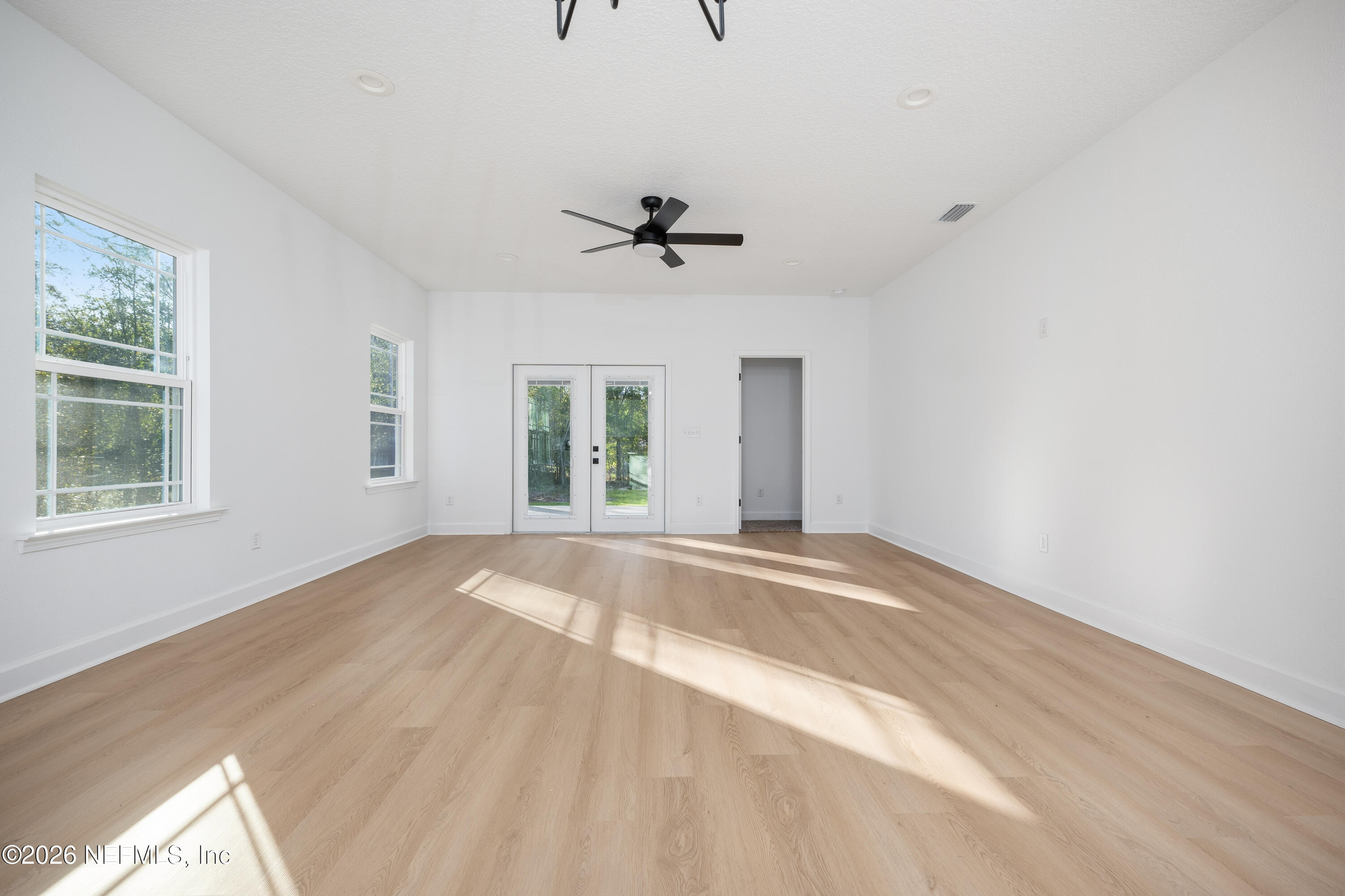 7596 Silver Sands Road Keystone Heights, FL 32656 - Photo 10 of 26 a view of an empty room with a window