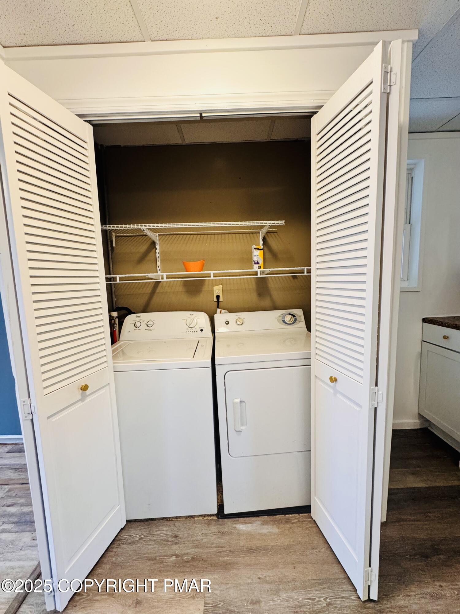 104 Serling Street Dupont, PA 18641 - Photo 6 of 18 a utility room with dryer and washer