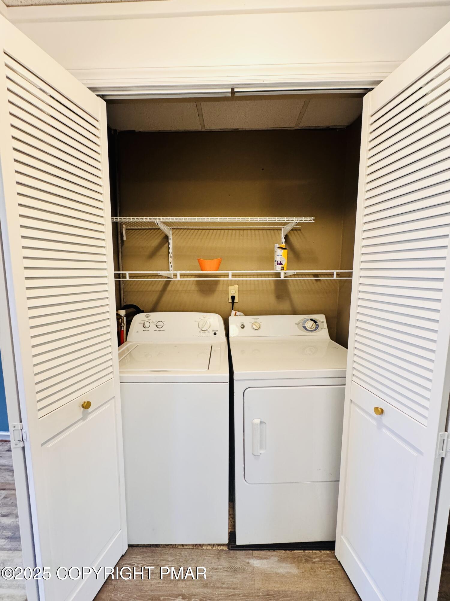 104 Serling Street Dupont, PA 18641 - Photo 7 of 18 a utility room with dryer and washer