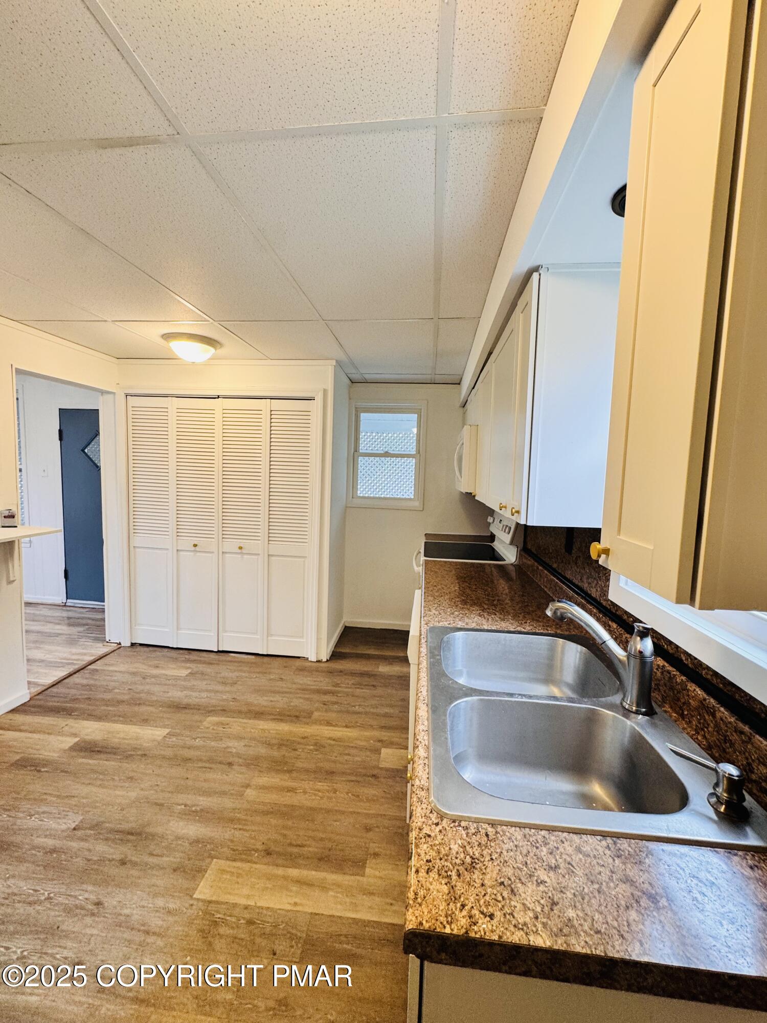 104 Serling Street Dupont, PA 18641 - Photo 9 of 18 a view of a sink sitting in a kitchen