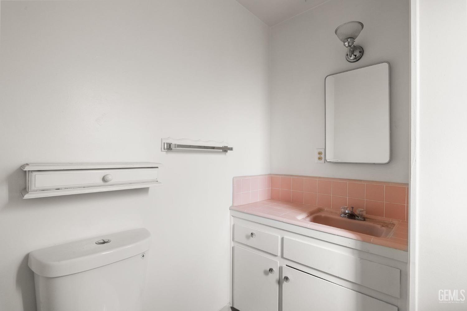 Undisclosed Address Taft, CA 93268 - Photo 10 of 14 a bathroom with a sink and a mirror