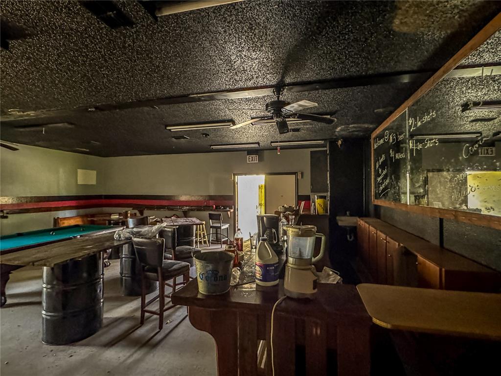 615 Hospital Road Brooksville, FL 34601 - Photo 11 of 75 a view of a room with gym equipment