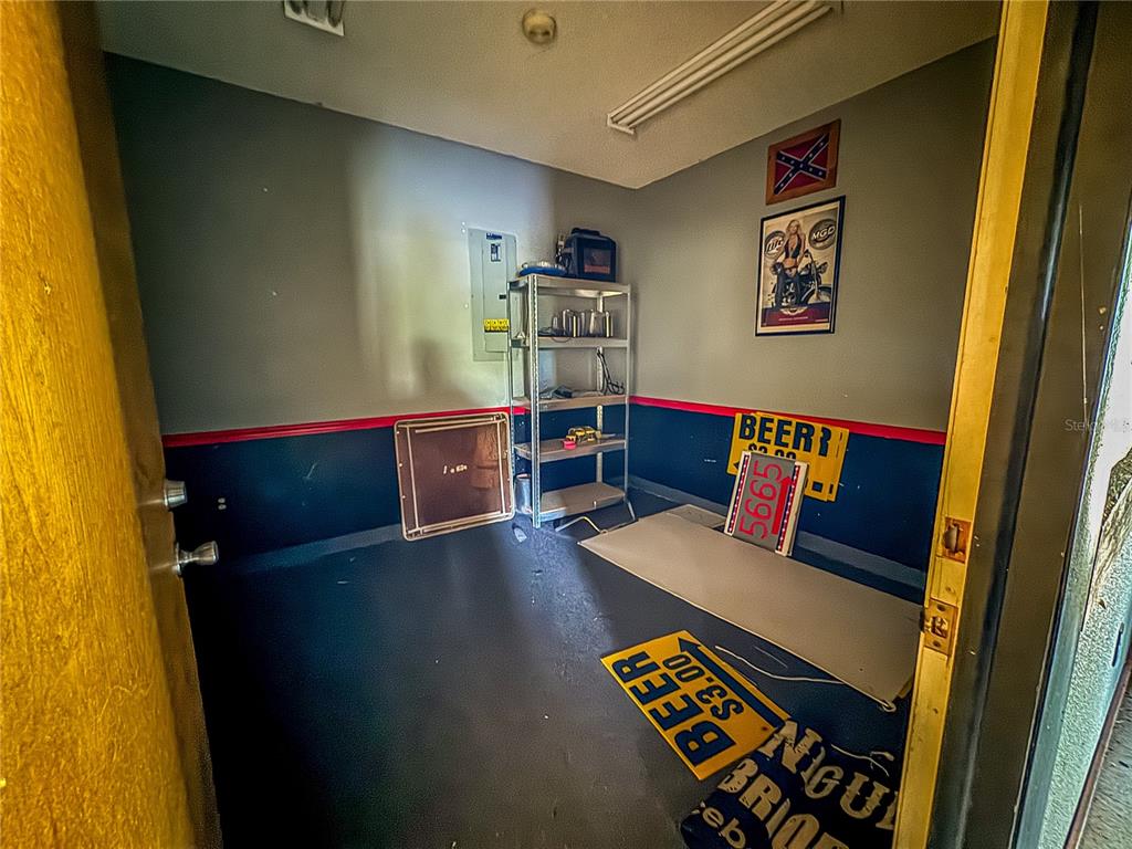 615 Hospital Road Brooksville, FL 34601 - Photo 14 of 75 a view of a bedroom with furniture and window