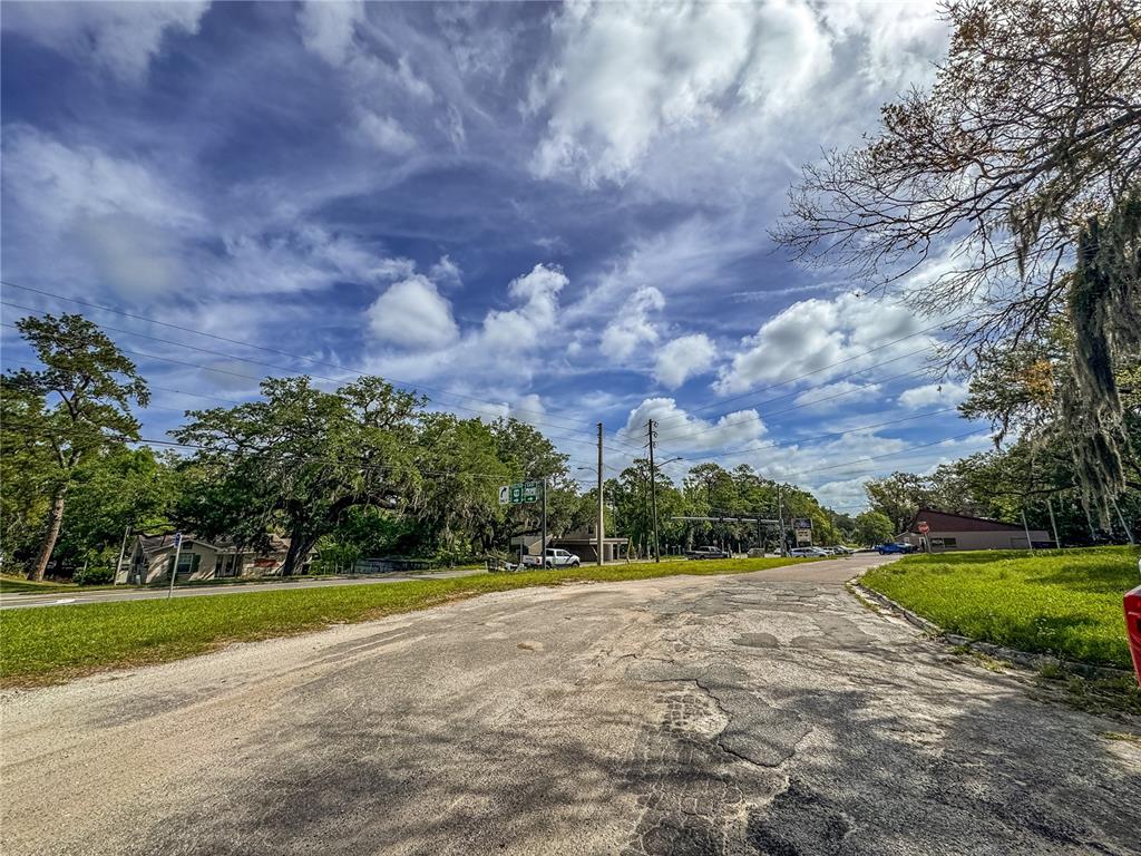 615 Hospital Road Brooksville, FL 34601 - Photo 18 of 75 a view of a playground with basketball court