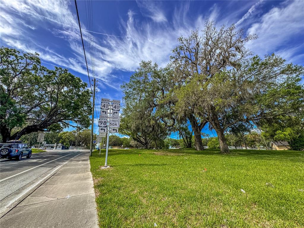 615 Hospital Road Brooksville, FL 34601 - Photo 2 of 75 a view of a park with large trees