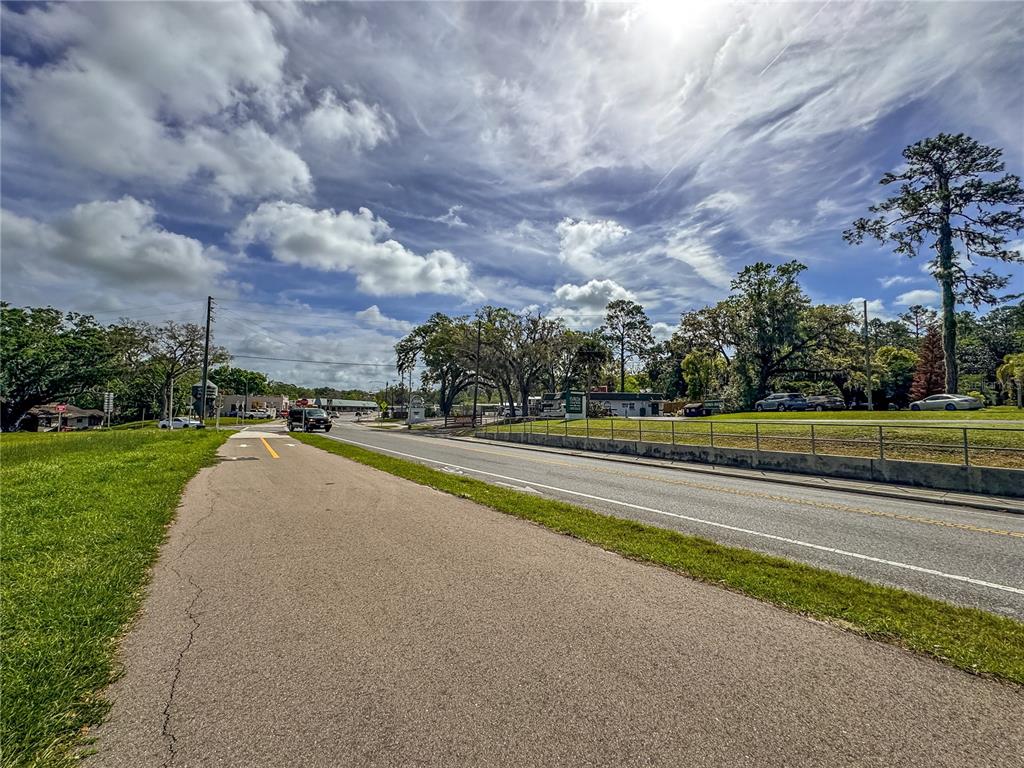 615 Hospital Road Brooksville, FL 34601 - Photo 28 of 75 a view of outdoor space with playground and green space