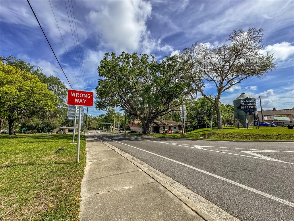 615 Hospital Road Brooksville, FL 34601 - Photo 41 of 75 a sign that is on the side of a road