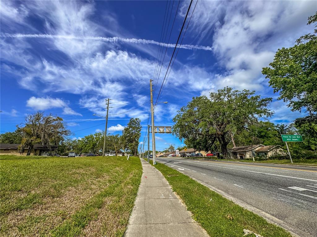 615 Hospital Road Brooksville, FL 34601 - Photo 50 of 75 a view of a yard with flower plants