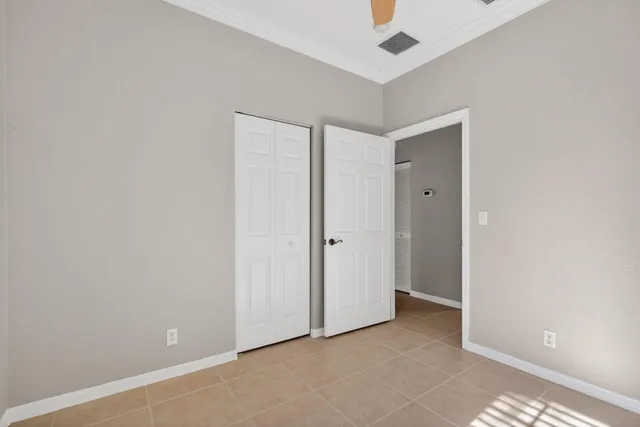 a kitchen with cabinets stainless steel appliances and a sink
