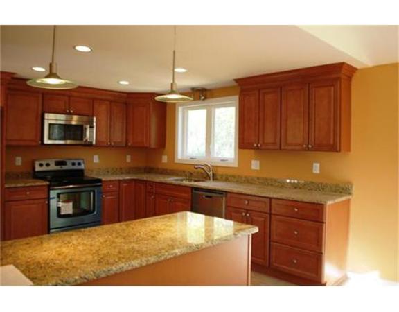 3 Peterson Road Natick, MA 01760 - Photo 1 of 19 a kitchen with kitchen island granite countertop a sink window and stainless steel appliances