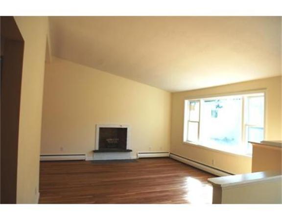 3 Peterson Road Natick, MA 01760 - Photo 8 of 19 a view of an empty room and wooden floor