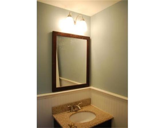 3 Peterson Road Natick, MA 01760 - Photo 10 of 19 a bathroom with a sink and a mirror
