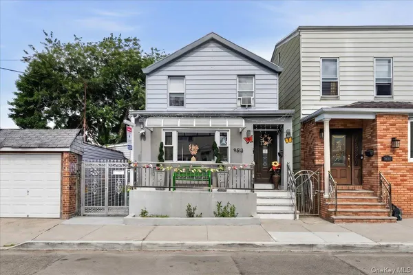 a view of a house with a small garden