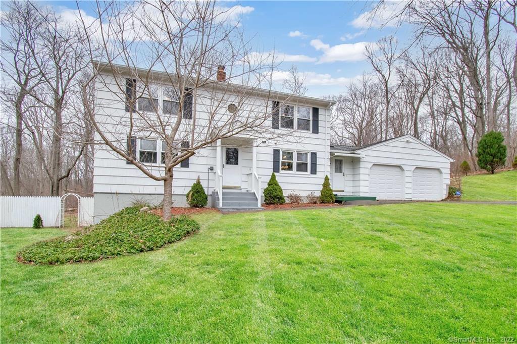 15 Rainbow Road Bethany, CT 06524 - Photo 1 of 1 a view of a house with a yard