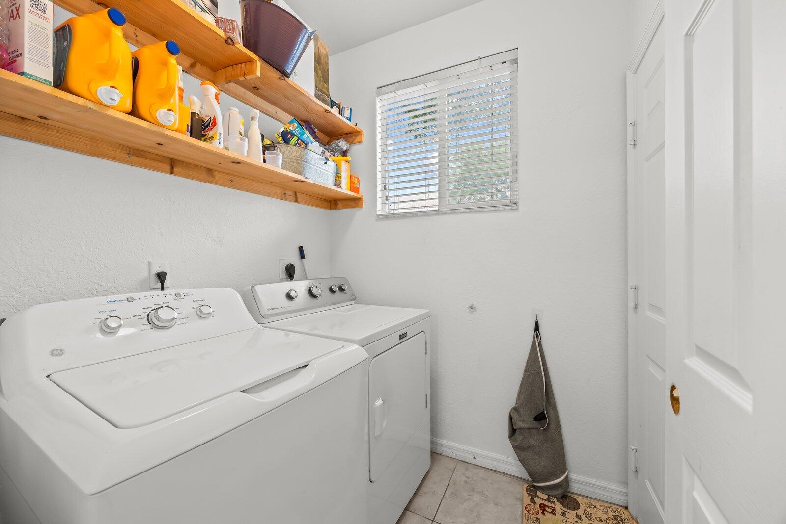 1955 Alamanda Way Riviera Beach, FL 33404 - Photo 18 of 25 a utility room with dryer and washer