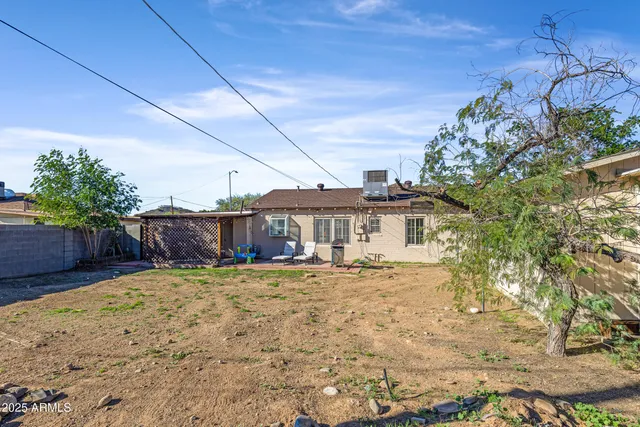 a view of swimming pool with outdoor seating