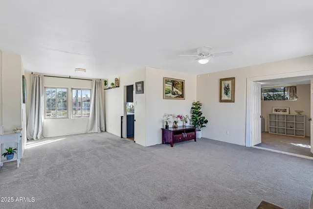 a view of an empty room with glass door