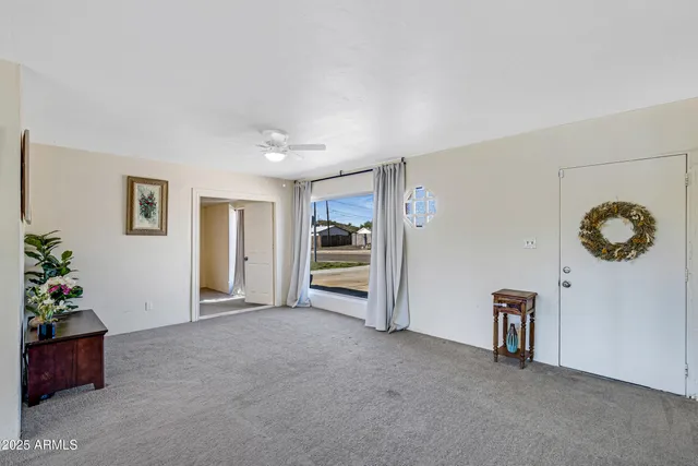 a view of livingroom with furniture and entryway