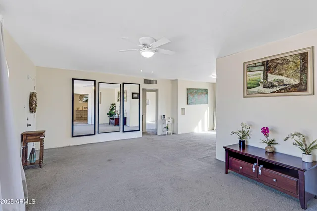 a living room with furniture and window