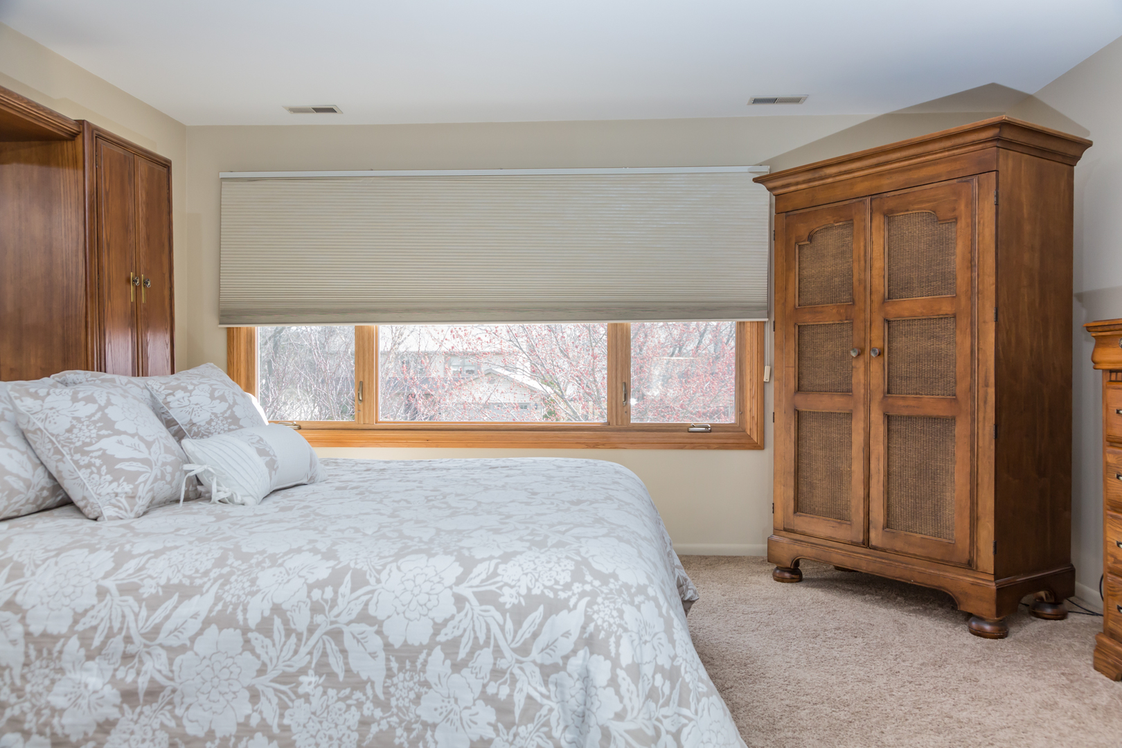 848 Kent Circle Bartlett, IL 60103 - Photo 14 of 23 a large bed sitting in a bedroom next to a window