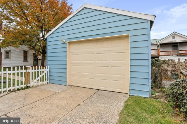 a front view of a house with a garage