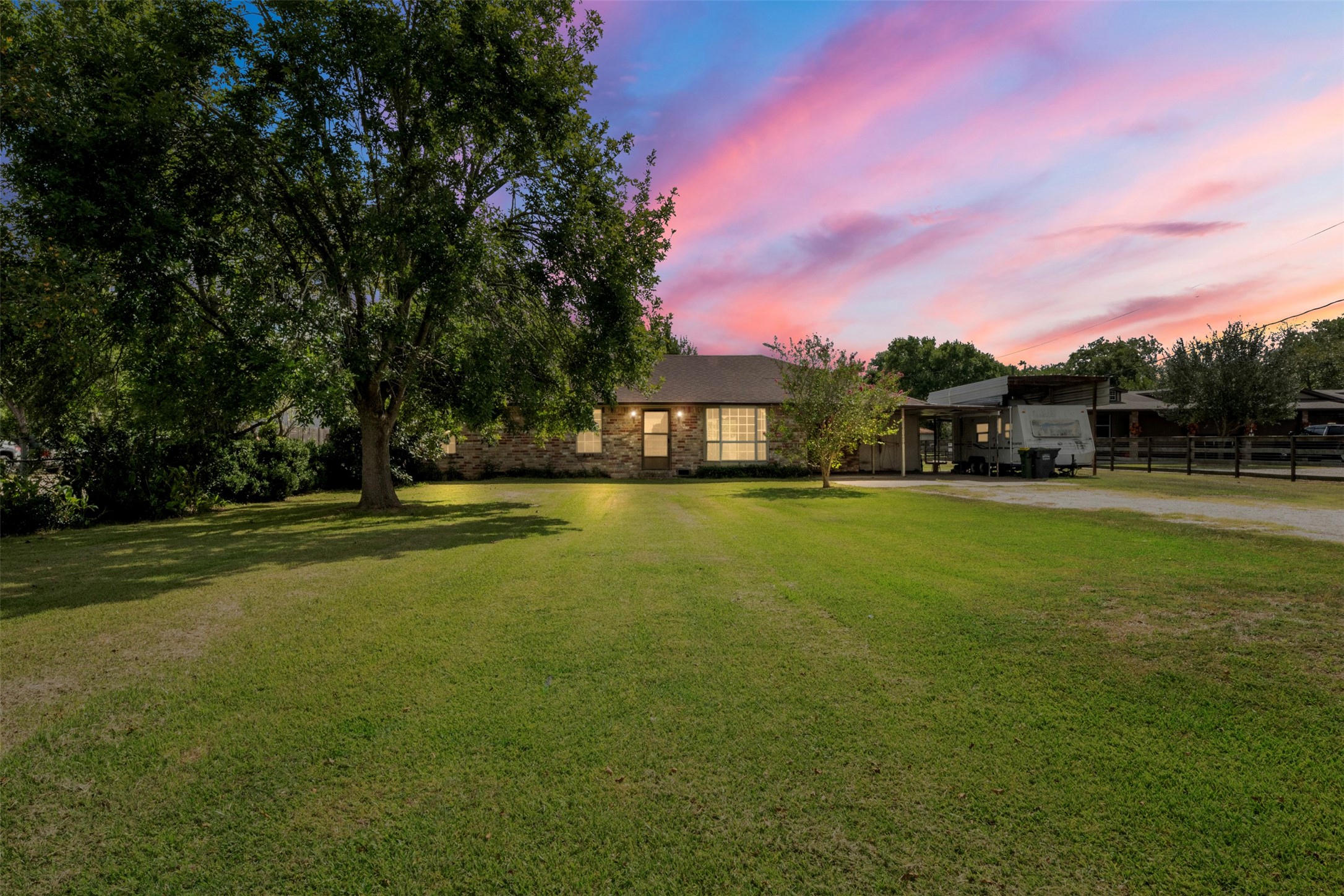 a view of a house with a big yard