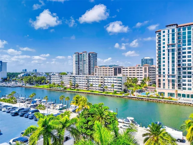 a view of a city with tall buildings