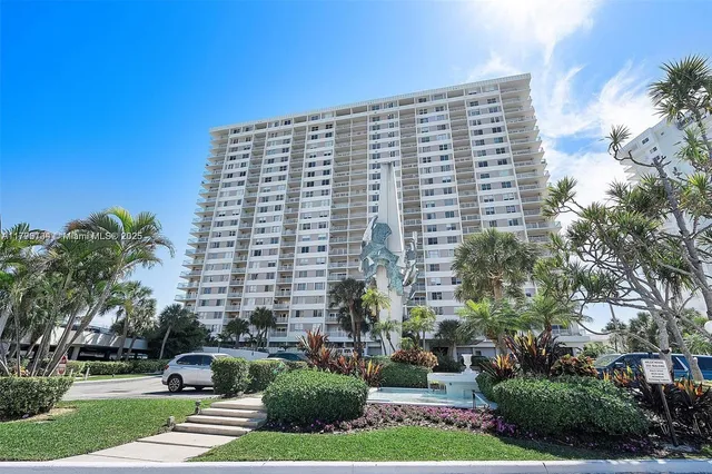 a view of a city with tall buildings