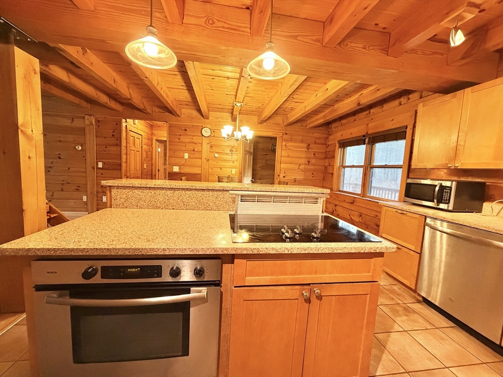1854 Greenwich Road Hardwick, MA 01082 - Photo 14 of 42 a kitchen with stainless steel appliances granite countertop a sink and a stove