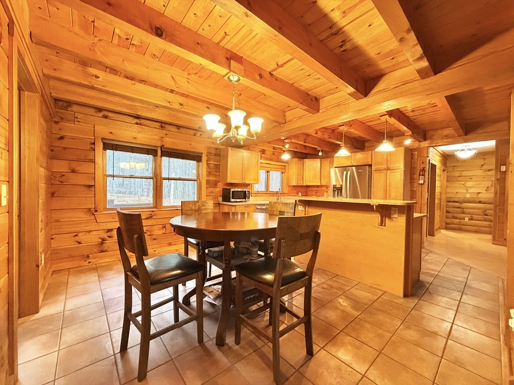 1854 Greenwich Road Hardwick, MA 01082 - Photo 18 of 42 a dining room with furniture and wooden floor