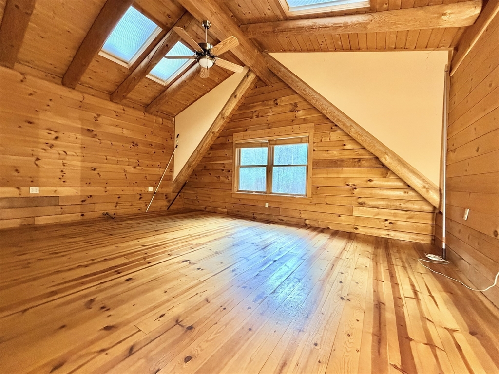1854 Greenwich Road Hardwick, MA 01082 - Photo 21 of 42 a view of empty room with wooden floor and windows