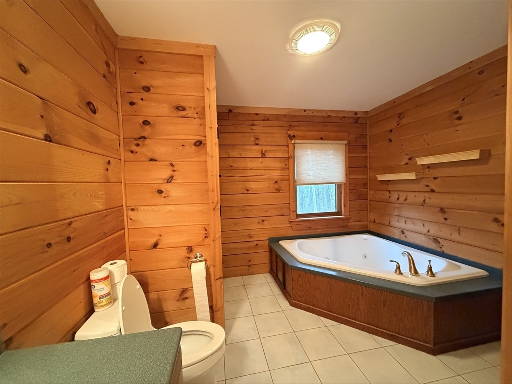 1854 Greenwich Road Hardwick, MA 01082 - Photo 30 of 42 a bathroom with a bathtub and toilet