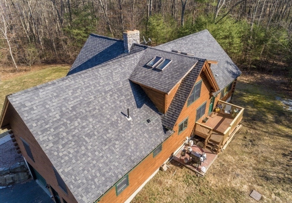 1854 Greenwich Road Hardwick, MA 01082 - Photo 7 of 42 a view of a wooden deck with a yard