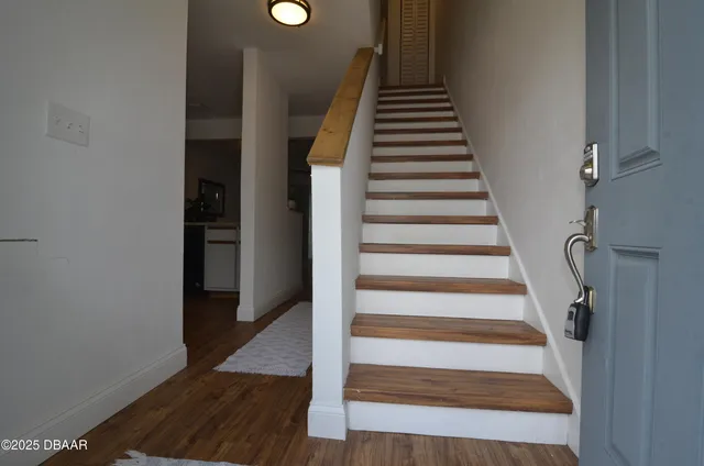 a view of an entryway with staircase