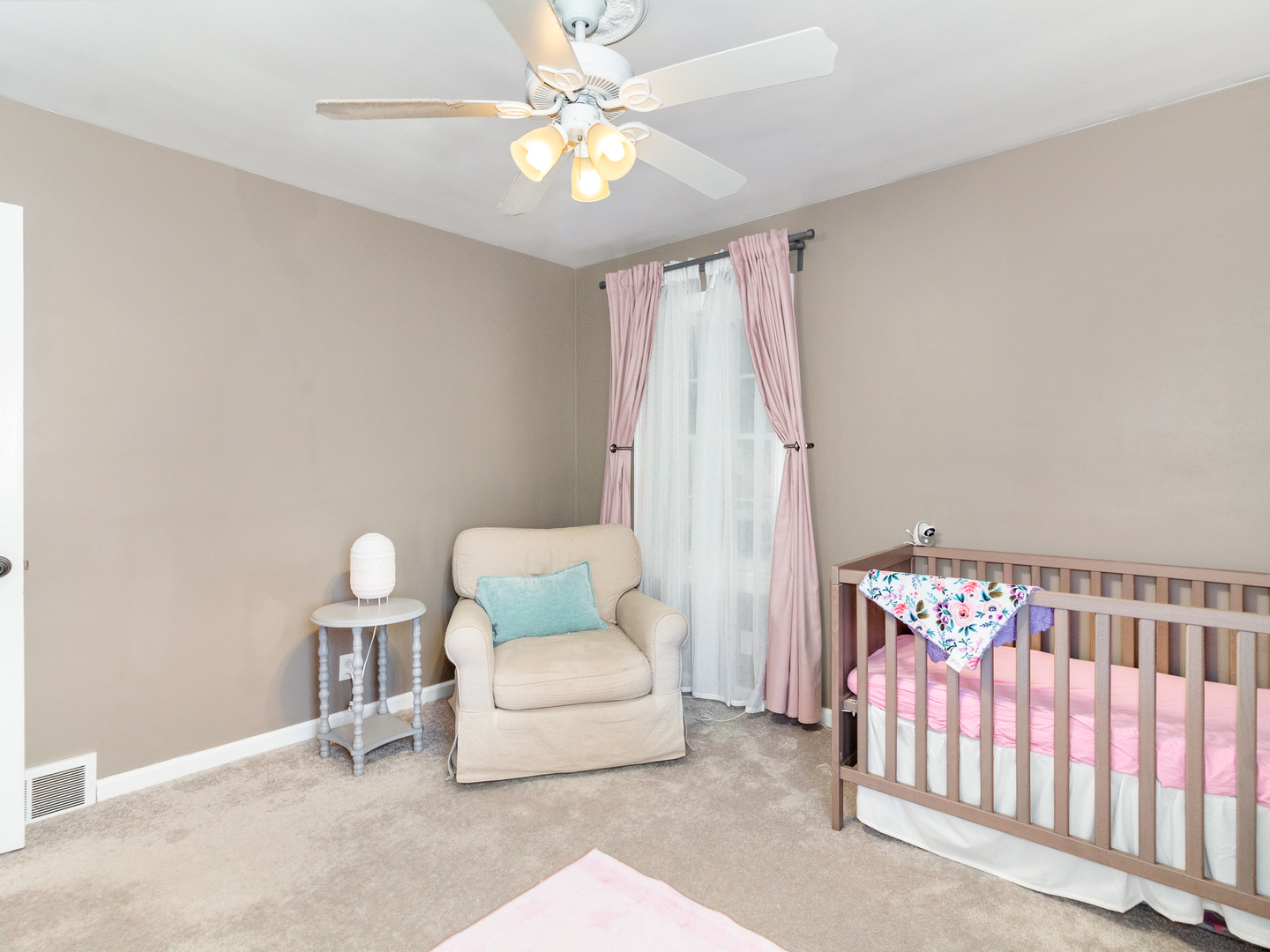 810 North Gary Avenue Wheaton, IL 60187 - Photo 24 of 36 a bedroom with furniture and a chandelier