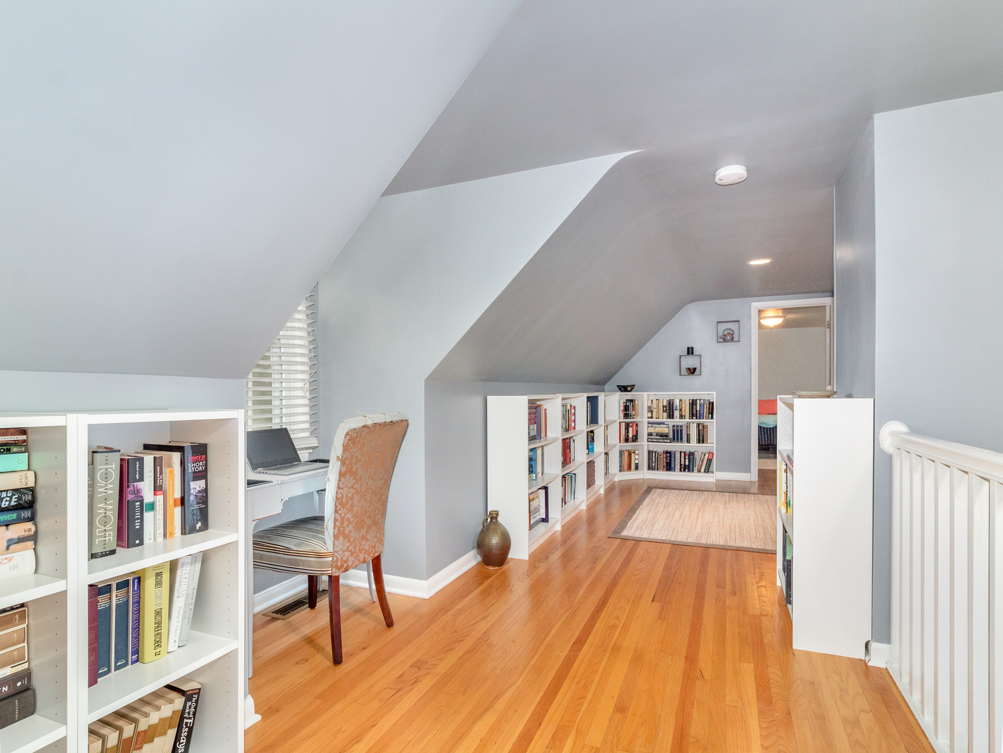 810 North Gary Avenue Wheaton, IL 60187 - Photo 25 of 36 a dining room with furniture and a book shelf