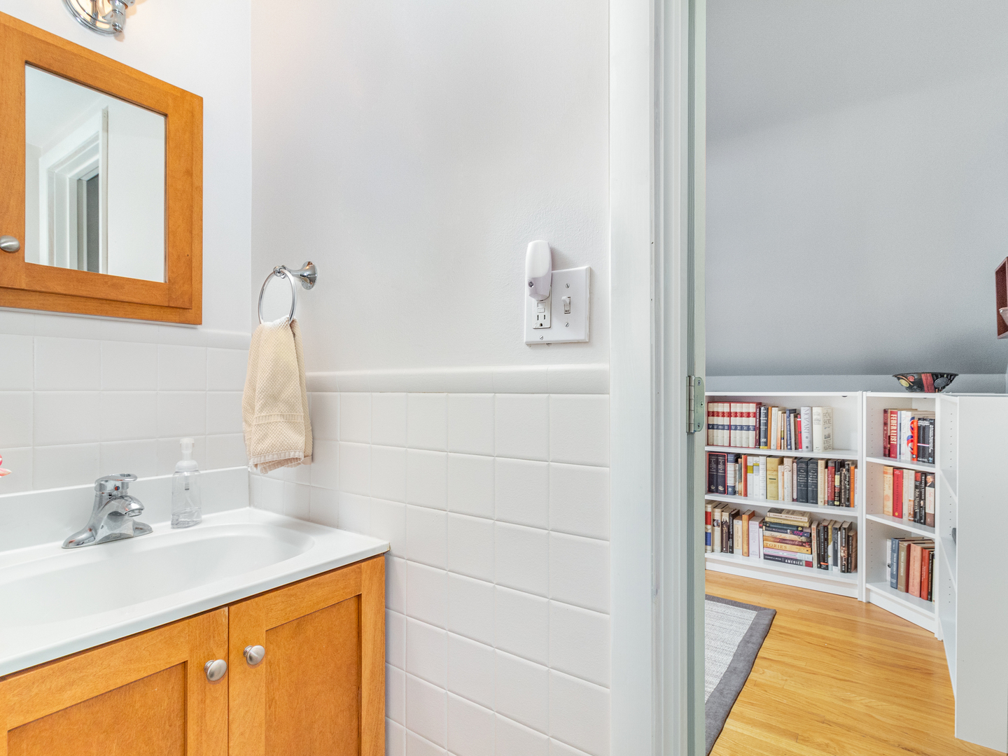 810 North Gary Avenue Wheaton, IL 60187 - Photo 31 of 36 a bathroom with a sink and a mirror