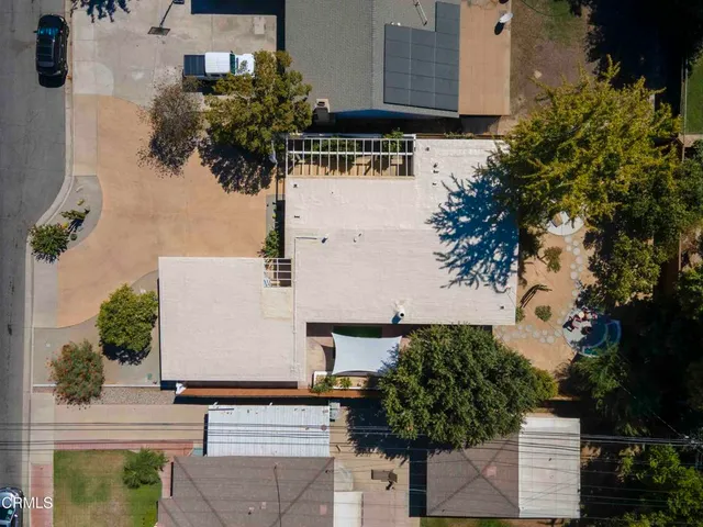 a view of a chairs and table in the patio