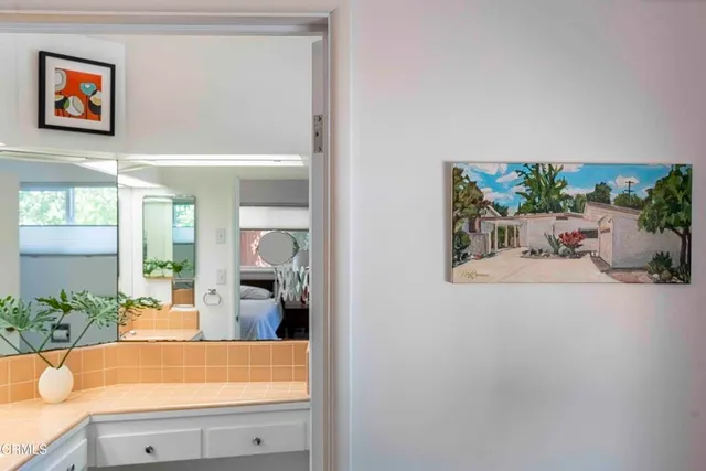 a bedroom with a bed and a table